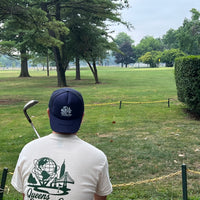 The QCC Unisphere Logo Tee - Light colors - Queens Country Club