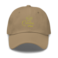 dad hat with 'Queens Open' text and a tennis racket emblem embroidered on the front. | Queens Country Club