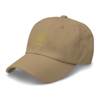 Beige cap with yellow text | Queens Country Club