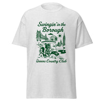 Queens Country Club T-shirt featuring vintage-style golf squirrel mascot driving a golf cart with NYC skyline, Unisphere, and Queensboro Bridge in background. Swingin' in the Borough golf streetwear for New York golfers