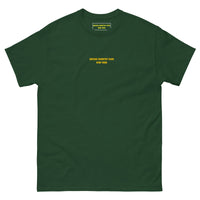 Queens Country Club T-shirt featuring minimalist front text 'Queens Country Club New York' and bold back graphic of NYC borough map with golf flags. Public golf streetwear celebrating New York City's municipal golf culture