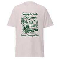 Queens Country Club T-shirt featuring vintage-style golf squirrel mascot driving a golf cart with NYC skyline, Unisphere, and Queensboro Bridge in background. Swingin' in the Borough golf streetwear for New York golfers
