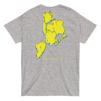 Queens Country Club T-shirt featuring minimalist front text 'Queens Country Club New York' and bold back graphic of NYC borough map with golf flags. Public golf streetwear celebrating New York City's municipal golf culture