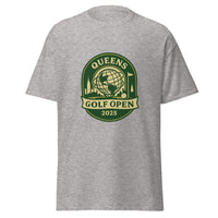 Sport Grey unisex T-shirt featuring a vintage-style graphic for the "Queens Golf Open 2025." The design includes the Unisphere at the center, surrounded by silhouettes of iconic NYC buildings, a golf ball, and a flagstick. The text "QUEENS GOLF OPEN 2025" is prominently displayed in cream and green tones within a badge-like emblem.