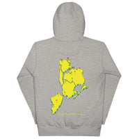 Front and back view of a heather grey Queens Country Club hoodie. The front features green text reading “Queens Country Club New York,” while the back showcases a bold yellow map of NYC's five boroughs styled as golf holes, with red flags and “The City’s Country Club” text at the bottom.