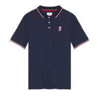 Navy polo shirt with embroidered QCC crest and varsity-inspired tipping