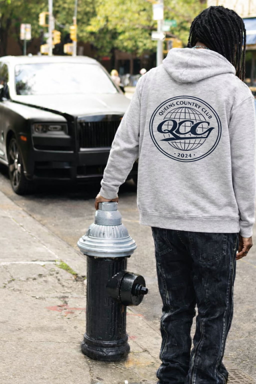    QCC Globe Hoodie at NYC street