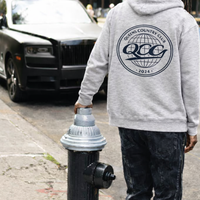    QCC Globe Hoodie at NYC street