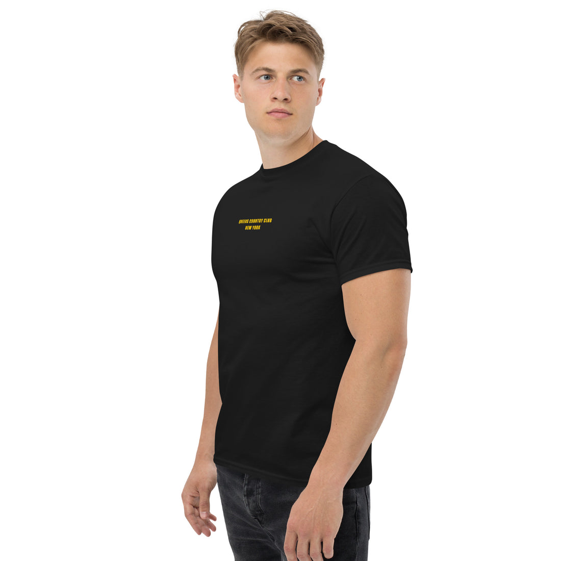   Queens Country Club T-shirt featuring minimalist front text 'Queens Country Club New York' and bold back graphic of NYC borough map with golf flags. Public golf streetwear celebrating New York City's municipal golf culture