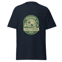  Navy blue unisex T-shirt featuring a vintage-style graphic for the "Queens Golf Open 2025." The design includes the Unisphere at the center, surrounded by silhouettes of iconic NYC buildings, a golf ball, and a flagstick. The text "QUEENS GOLF OPEN 2025" is prominently displayed in cream and green tones within a badge-like emblem.