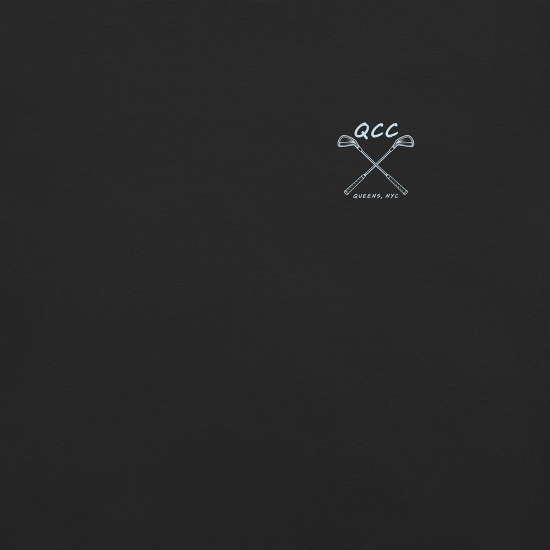 QCC Iron Lineup Tee in Black, front view showing QCC crossed-club chest emblem.