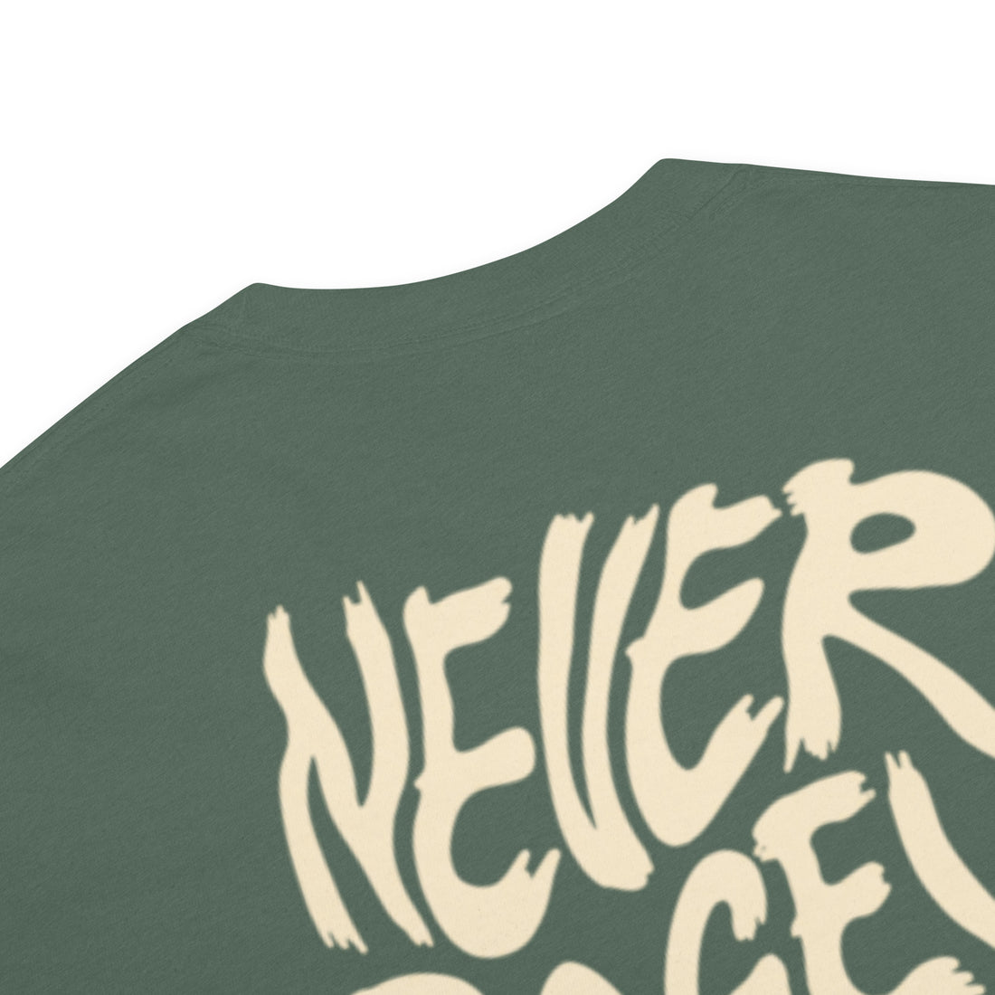 Close-up detail of Blue Spruce Never Bogey Again heavyweight T-shirt with cream graphic