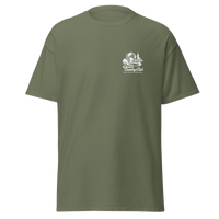 Green t-shirt with a logo on the chest against Queens Unisphere Golf Tee | Queens Country Club