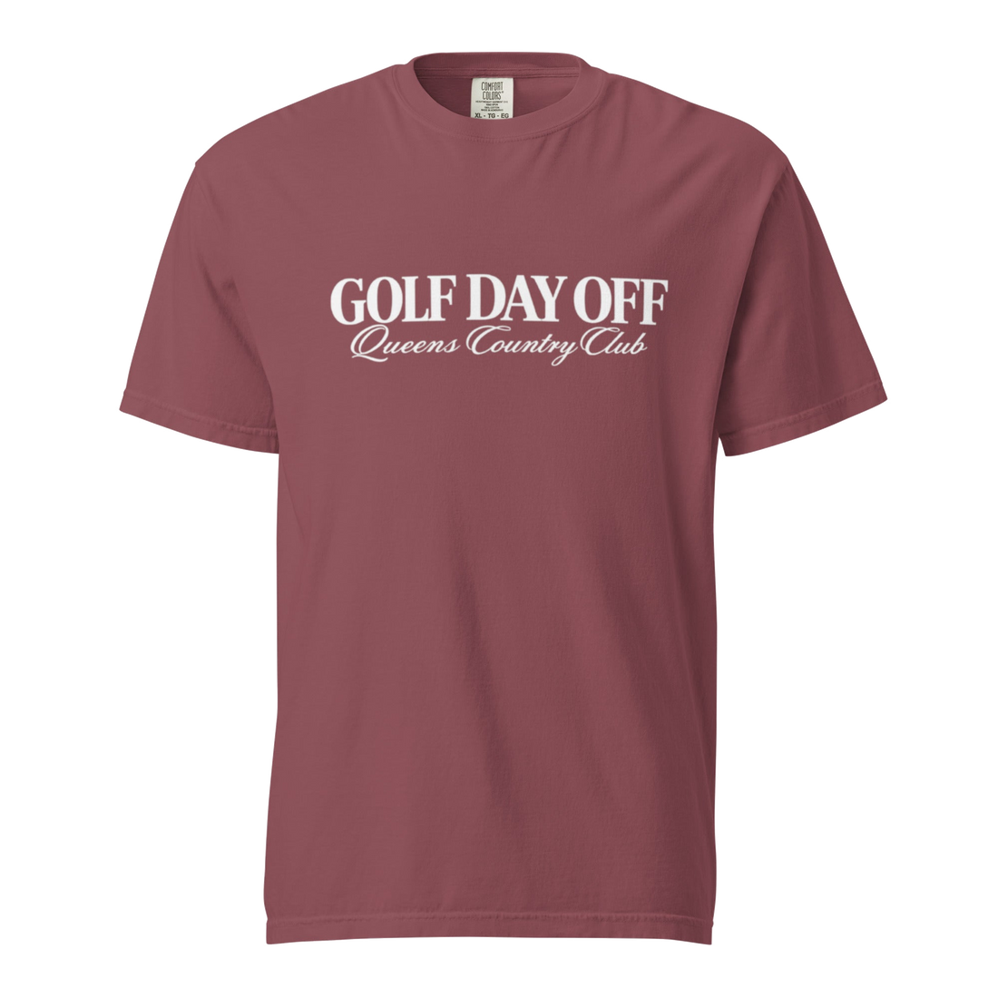 Golf Day Off Tee featuring white f-inspired Queens Country Club graphic on a garment-dyed heavyweight t-shirt.