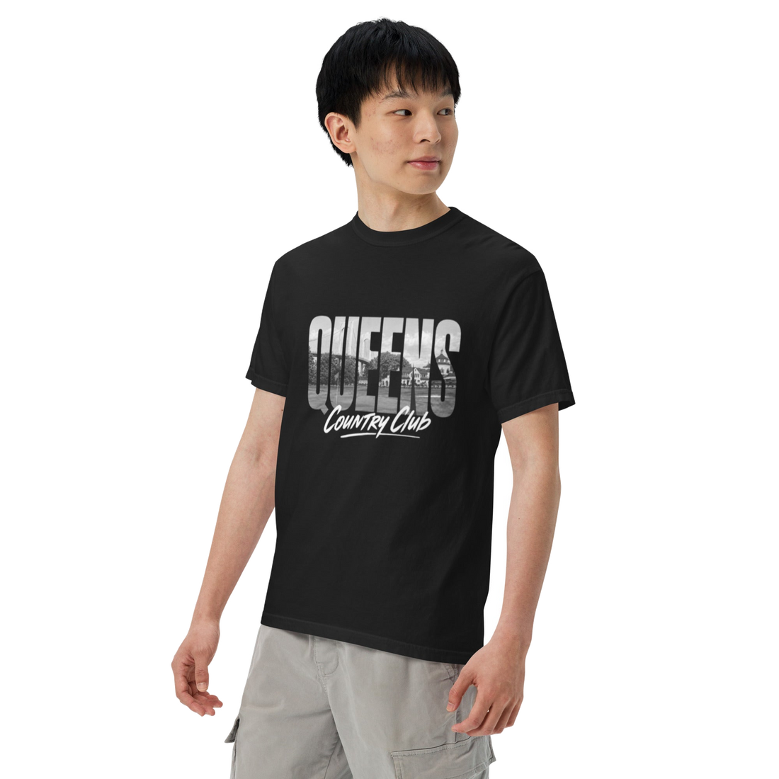Black Queens Muni Vista Tee with a monochrome Queens municipal-golf graphic, left-front view | Queens Country Club