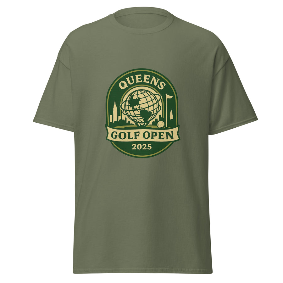 Military Green unisex T-shirt featuring a vintage-style graphic for the "Queens Golf Open 2025." The design includes the Unisphere at the center, surrounded by silhouettes of iconic NYC buildings, a golf ball, and a flagstick. The text "QUEENS GOLF OPEN 2025" is prominently displayed in cream and green tones within a badge-like emblem.